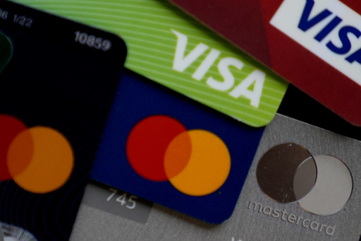 FILE - Several VISA and MASTER credit cards are shown in Buffalo Grove, Ill., Thursday, Feb. 8, 2024. (AP Photo/Nam Y. Huh, File)