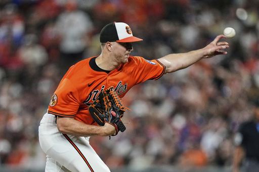 Baltimore Orioles starting pitcher Trevor Rogers delivers during the second inning of a baseball game against the Los Angeles Dodgers, Saturday, Sept. 6, 2025, in Baltimore. (AP Photo/Stephanie Scarbrough)
