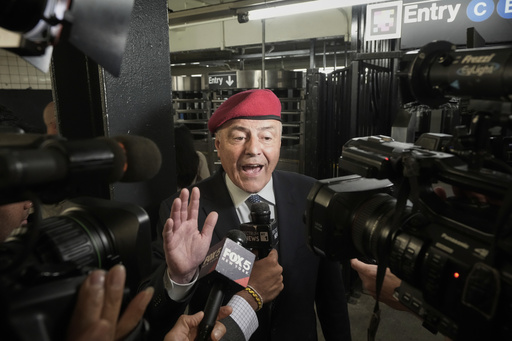 New York City mayoral candidate Curtis Sliwa is interviewed in a subway entrance as he campaigns, in New York, Monday, Aug. 18, 2025. (AP Photo/Richard Drew)