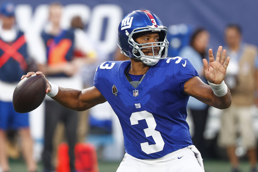 New York Giants quarterback Russell Wilson (3) passes the ball against the New York Jets during the first quarter of an NFL football game, Saturday, Aug. 16, 2025, in East Rutherford, N.J. (AP Photo/Noah K. Murray)