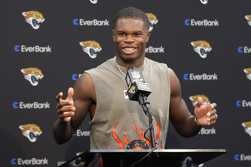 Jacksonville Jaguars wide receiver Travis Hunter speaks at a news conference after an NFL football game against the Carolina Panthers, Sunday, Sept. 7, 2025, in Jacksonville, Fla. (AP Photo/John Raoux)