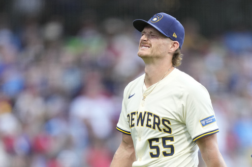 Milwaukee Brewers pitcher Shelby Miller reacts as he walks off the field during the eighth inning of a baseball game against the Philadelphia Phillies, Monday, Sept. 1, 2025, in Milwaukee. (AP Photo/Kayla Wolf)