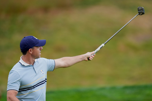 Europe's Rory McIlroy celebrates after a putt on the fifth hole at Bethpage Black golf course during the Ryder Cup golf tournament, Friday, Sept. 26, 2025, in Farmingdale, N.Y. (AP Photo/Seth Wenig)