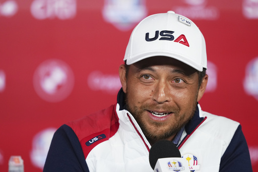 United States' Xander Schauffele speaks during a news conference before a practice round at the Ryder Cup golf tournament, Tuesday, Sept. 23, 2025, in Farmingdale, N.Y., at Bethpage State Park's Black Course between the United States and Europe. (AP Photo/Linsey Wasson)
