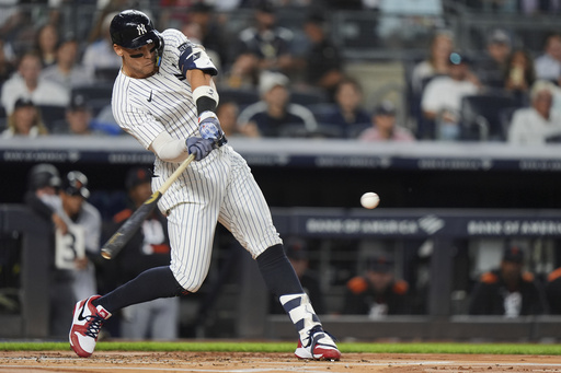 New York Yankees' Aaron Judge hits a home run during the first inning of a baseball game against the Detroit Tigers Thursday, Sept. 11, 2025, in New York. (AP Photo/Frank Franklin II)