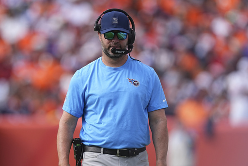 Tennessee Titans head coach Brian Callahan walks the sideline during the second half of an NFL football game against the Denver Broncos, Sunday, Sept. 7, 2025, in Denver. (AP Photo/David Zalubowski)