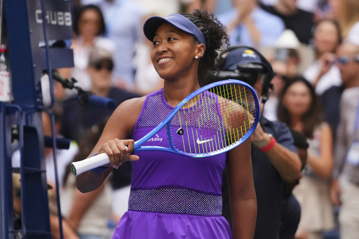 Naomi Osaka, of Japan, celebrates after winning a match against Coco Gauff, of the United States, during the fourth round of the US Open tennis championships, Monday, Sept. 1, 2025, in New York. (AP Photo/Kirsty Wigglesworth)