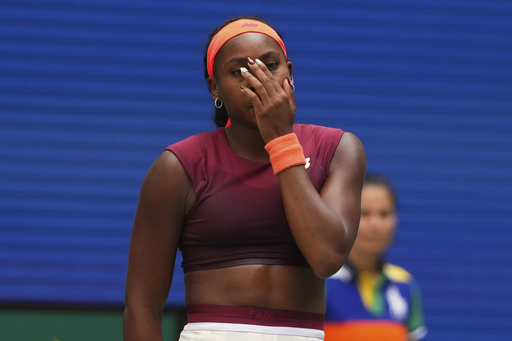 Coco Gauff, of the United States, reacts during a match against Naomi Osaka, of Japan, in the fourth round of the US Open tennis championships, Monday, Sept. 1, 2025, in New York. (AP Photo/Kirsty Wigglesworth)