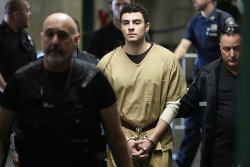 Luigi Mangione is escorted into Manhattan state court in New York, Tuesday, Sept. 16, 2025. (AP Photo/Seth Wenig)