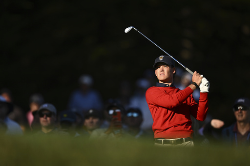 The USA team's Jackson Koivun hits from the third tee during Walker Cup golf matches against the Great Britain and Ireland team, at Cypress Point Club on Sunday, Sept. 7, 2025, in Pebble Beach, Calif. (AP Photo/Thien-An Truong )
