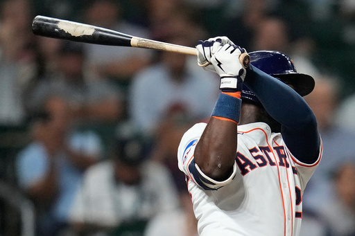 Houston Astros' Taylor Trammell hits a double off of New York Yankees relief pitcher David Bednar during the ninth inning of a baseball game Thursday, Sept. 4, 2025, in Houston. (AP Photo/Karen Warren)