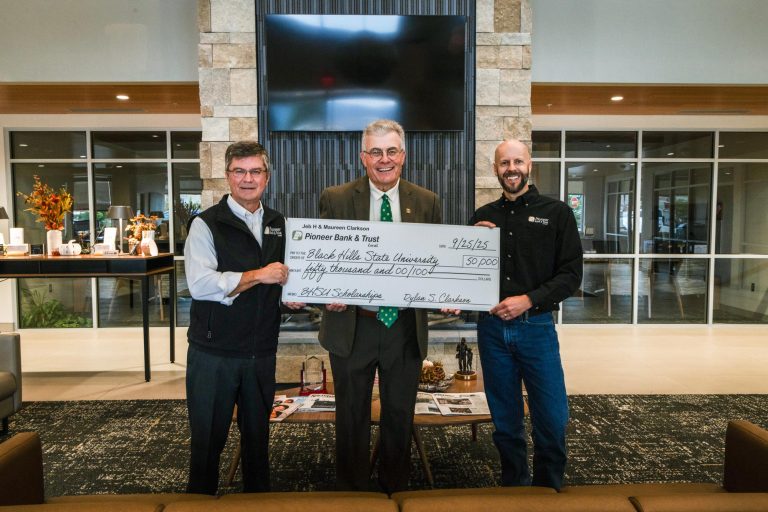 Jeb H. Clarkson; Steve Meeker, VP/University Advancement; and Alex Gustafson, SVP/Retail Banking Manager.