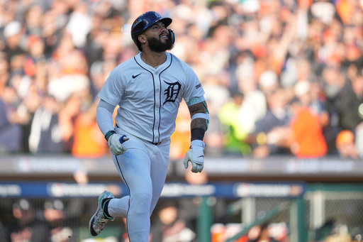 Detroit Tigers' Gleyber Torres watches his solo home run during the seventh inning in Game 4 of baseball's American League Division Series against the Seattle Mariners Wednesday, Oct. 8, 2025, in Detroit. (AP Photo/Paul Sancya)