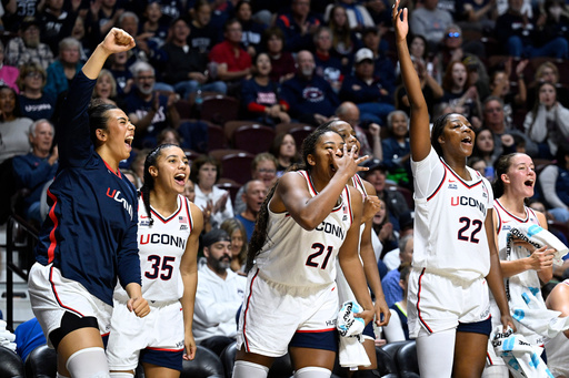 From left to right, UConn's Jana el Alfy, Azzi Fudd, Sarah Strong, and Serah Williams react in the second half of an exhibition NCAA college basketball game against Boston College, Monday, Oct. 13, 2025, in Uncasville, Conn. (AP Photo/Jessica Hill)