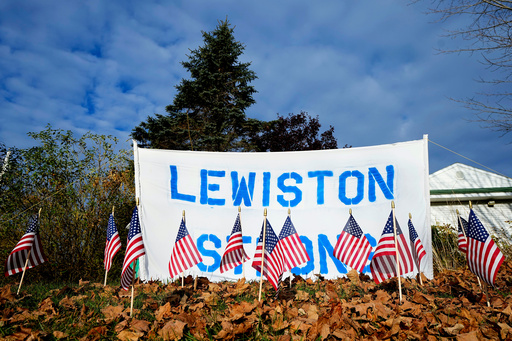 FILE - A make-shift memorial lines Main Street following a deadly mass shooting in Maine, Nov. 3, 2023, in Lewiston, Maine. (AP Photo/Matt York, File)