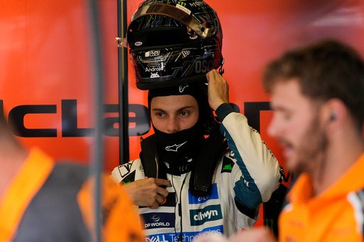 McLaren driver Oscar Piastri of Australia prepares for the qualification for the Formula One U.S. Grand Prix race in Austin, Texas, Saturday, Oct. 18, 2025. (AP Photo/John Locher)