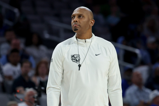 FILE - Memphis head coach Penny Hardaway walks onto the court during a timeout in the second half of an NCAA college basketball game against Tulane in the semifinals of the American Athletic Conference tournament, March 15, 2025, in Fort Worth, Texas. (AP Photo/Gareth Patterson, File)