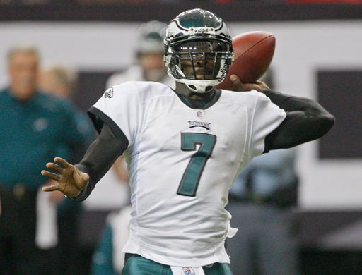FILE - Philadelphia Eagles quarterback Michael Vick throws in the first quarter during an NFL football game against the Atlanta Falcons, Dec. 6, 2009 in Atlanta. (AP Photo/John Bazemore, file)