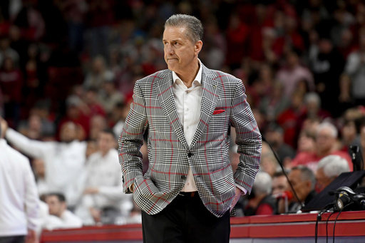 FILE - Arkansas coach John Calipari stands on the sidelines against Mississippi State during an NCAA college basketball game, March 8, 2025, in Fayetteville, Ark. (AP Photo/Michael Woods, File)