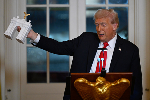 President Donald Trump addresses a dinner for donors who have contributed to build the new ballroom at the White House, Wednesday, Oct. 15, 2025, in Washington. (AP Photo/John McDonnell)