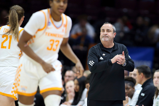 FILE - South Florida head coach Jose Fernandez, right, looks on as Tennessee pulls away during the fourth quarter of the first round of the NCAA college basketball tournament, March 21, 2025, in Columbus, Ohio. (AP Photo/Joe Maiorana, File)