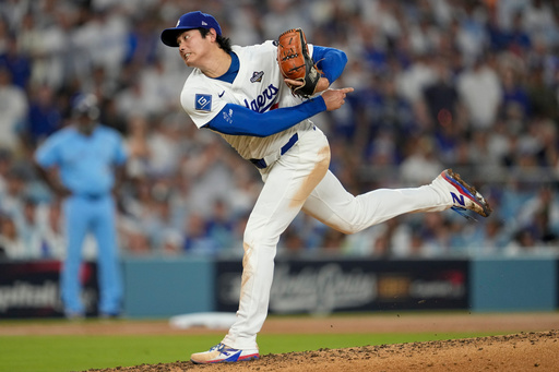 Los Angeles pitcher Dodgers' Shohei Ohtani twos against the Toronto Blue Jays during the fourth inning in Game 4 of baseball's World Series, Tuesday, Oct. 28, 2025, in Los Angeles. (AP Photo/Ashley Landis)