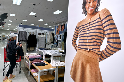 FILE - A shopper shops at a retail store in Arlington Heights, Ill., Tuesday, Sept. 23, 2025. (AP Photo/Nam Y. Huh, File)