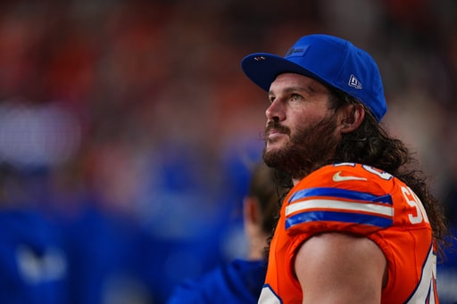 FILE - Denver Broncos inside linebacker Alex Singleton watches from the sidelines during the second half of an NFL football game against the Las Vegas Raiders Thursday, Nov. 6, 2025, in Denver. (AP Photo/Jack Dempsey, File)