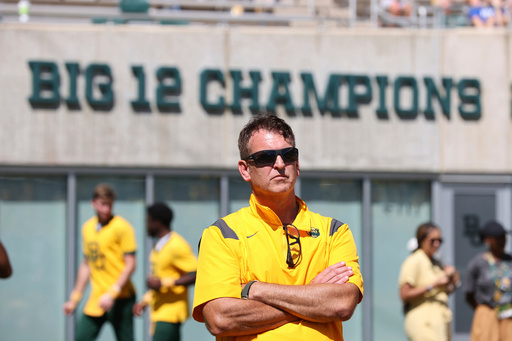 FILE - Baylor athletic director Mack Rhoades looks on from the sideline during an NCAA college football game against BYU, Saturday, Sept. 28, 2024, in Waco, Texas. (AP Photo/Jerry Larson, File)