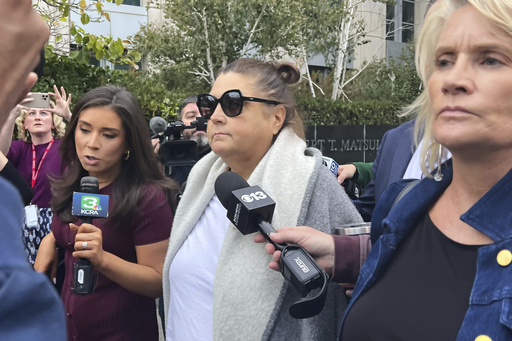 Dana Williamson, a former top aide to Gov. Gavin Newsom, center, leaves the courthouse Wednesday, Nov. 12, 2025, in Sacramento, Calif., after being indicted on federal charges alleging her involvement in a scheme to steal campaign money from former federal Health Secretary Xavier Becerra. (AP Photo/Sophie Austin)