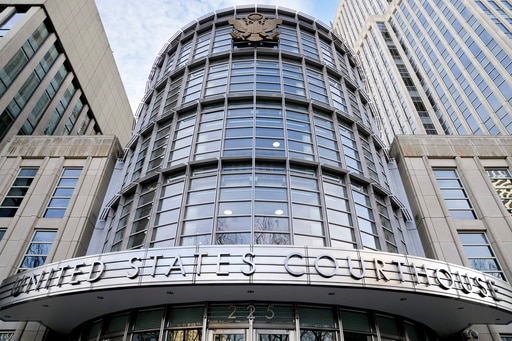 FILE - The seal of the United States is displayed on the facade of Federal court in Brooklyn, Jan. 17, 2023, in New York. (AP Photo/John Minchillo, File)