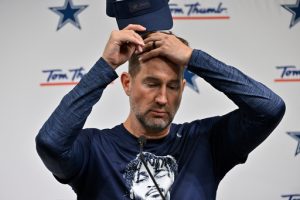 Dallas Cowboys head coach Brian Schottenheimer pauses during a news conference after an NFL football game against the Las Vegas Raiders Monday, Nov. 17, 2025, in Las Vegas. (AP Photo/David Becker)