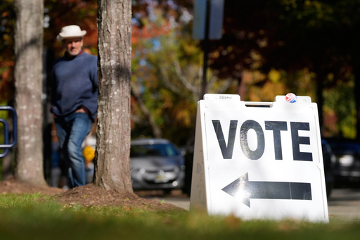 A sign is displayed outside a polling site in River Edge, N.J., Tuesday, Nov. 4, 2025. (AP Photo/Seth Wenig)