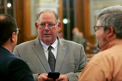 FILE - Kansas House Speaker Dan Hawkins, R-Wichita, speaks to fellow House members and staffers before a House debate April 30, 2024 at the Statehouse in Topeka, Kan. (AP Photo/John Hanna, File)