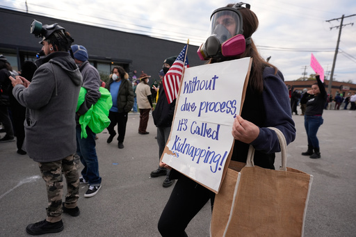 Protesters gather outside an ICE processing facility in the Chicago suburb of Broadview, Ill., Saturday, Nov. 1, 2025. (AP Photo/Alex Brandon)