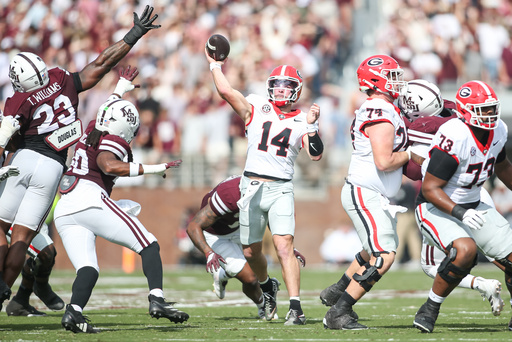 Georgia quarterback Gunner Stockton (14) throws a pass against Mississippi State during the first half of an NCAA college football game in Starkville, Miss., Saturday, Nov. 8, 2025. (AP Photo/James Pugh)