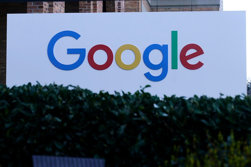 FILE - A Google sign is displayed at the company's office in San Francisco, April 12, 2023. (AP Photo/Jeff Chiu, File)