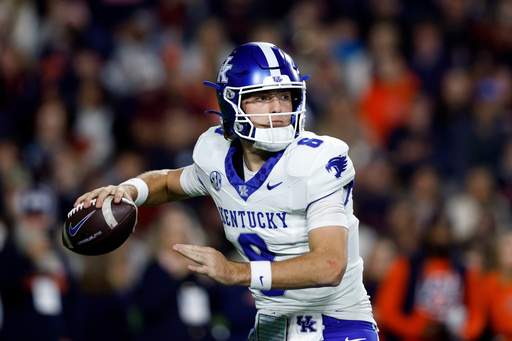 Kentucky quarterback Cutter Boley throws a pass during the first half of an NCAA college football game against Auburn Saturday, Nov. 1, 2025, in Auburn, Ala. (AP Photo/Butch Dill)