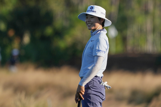 Somi Lee of Korea smiles at the end of the first round of the LPGA Tour Championship golf tournament, Thursday, Nov. 20, 2025, in Naples, Fla. (AP Photo/Marta Lavandier)
