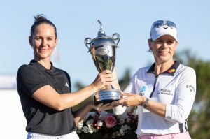 Linn Grant, left, and Annika Sorenstam, right, hold the championship trophy after Grant's win on the final day of The Annika LPGA golf tournament in Belleair, Fla., Sunday, Nov. 16, 2025. (AP Photo/Willie J. Allen Jr.)