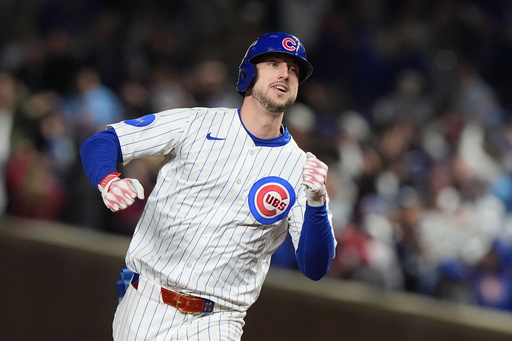 Chicago Cubs' Kyle Tucker (30) runs the bases after hitting a solo home run during the seventh inning of Game 4 of baseball's National League Division Series against the Milwaukee Brewers Thursday, Oct. 9, 2025, in Chicago. (AP Photo/Nam Y. Huh)