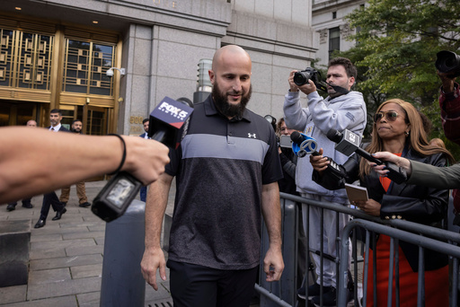 FILE - Mohamed Bahi, New York City Mayor's liaison to the Muslim community, exits Manhattan Federal Court, Oct. 8, 2024, in New York. (AP Photo/Yuki Iwamura, File)