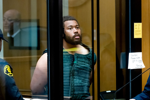 Cedric Irving Jr., charged with murder in the shooting of former football coach John Beam appears in court Tuesday, Nov. 18, 2025, in Oakland, Calif. (Noah Berger/San Francisco Chronicle via AP, Pool)
