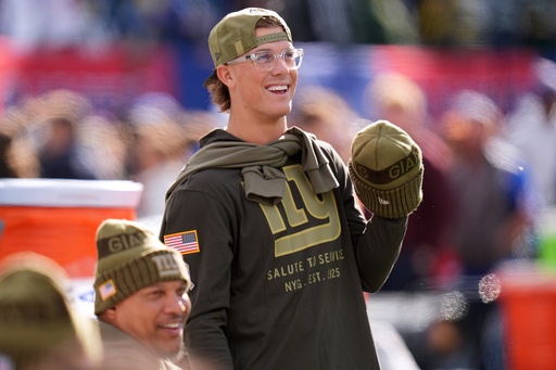New York Giants' Jaxson Dart is seen before an NFL football game against the Green Bay Packers Sunday, Nov. 16, 2025, in East Rutherford, N.J. (AP Photo/Seth Wenig)