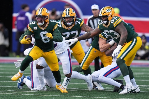 Green Bay Packers' Josh Jacobs runs for a first down during the first half of an NFL football game against the New York Giants Sunday, Nov. 16, 2025, in East Rutherford, N.J. (AP Photo/Seth Wenig)
