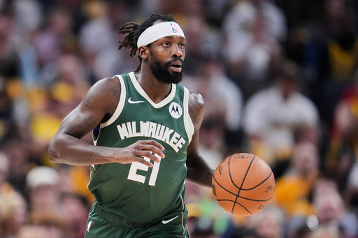 FILE - Milwaukee Bucks' Patrick Beverley dribbles during the first half of Game 4 of the first round NBA playoff basketball series against the Indiana Pacers, Sunday, April 28, 2024, in Indianapolis. (AP Photo/Michael Conroy, File)