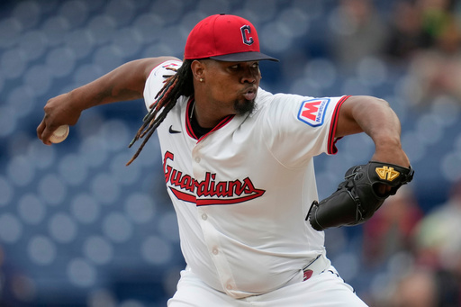 FILE - Cleveland Guardians' Luis Ortiz pitches in the first inning of a baseball game against the Minnesota Twins, in Cleveland, April 30, 2025. (AP Photo/Sue Ogrocki, File)