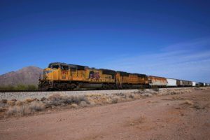 FILE - A Union Pacific freight train travels along the tracks April 17, 2025, in Eloy, Ariz. (AP Photo/Ross D. Franklin, File)