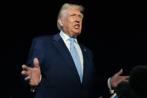 President Donald Trump speaks to reporters before boarding Air Force One at Palm Beach International Airport in West Palm Beach Fla., on his way back to the White House, Sunday, Nov. 16, 2025. (AP Photo/Manuel Balce Ceneta)