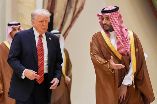 FILE - President Donald Trump arrives with Saudi Crown Prince Mohammed bin Salman for the group photo with Gulf Cooperation Council leaders during the GCC Summit in Riyadh, Saudi Arabia, May 14, 2025. (AP Photo/Alex Brandon, File)